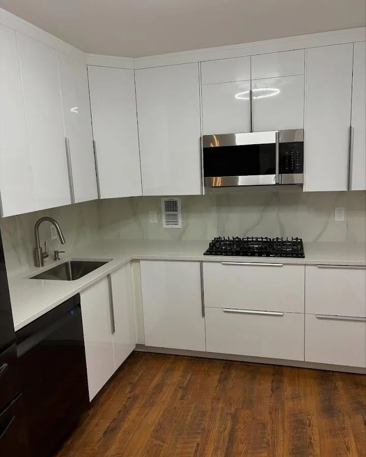 Restored kitchen with white cabinets after water damage in Monterey Park